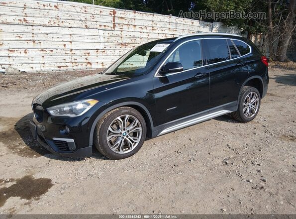 WBXHT3Z34H4A64951 2017 BMW X1 Black Front left