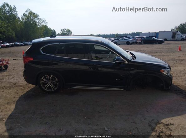 WBXHT3Z34H4A64951 2017 BMW X1 Black 360 interior view