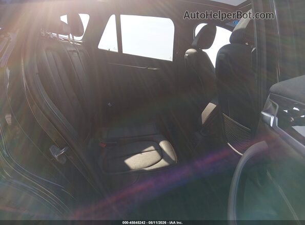 WBXHT3Z34H4A64951 2017 BMW X1 Black VIN sticker view
