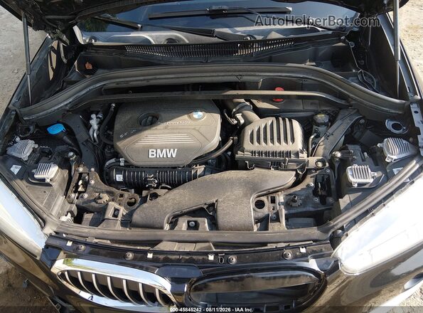 WBXHT3Z34H4A64951 2017 BMW X1 Black Rear view