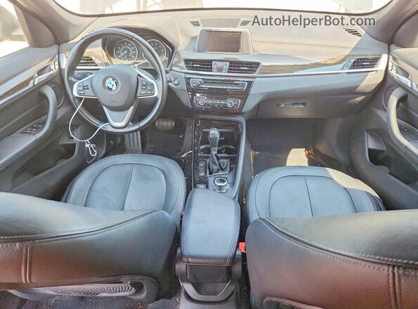 WBXHT3Z35G4A49177 2016 BMW X1 Black Առջևի վահանակի տեսք