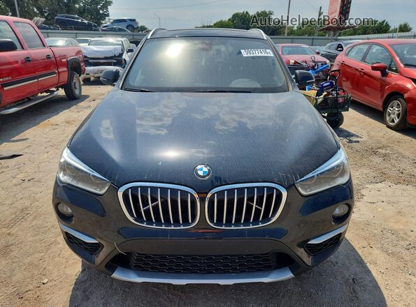WBXHT3Z35G4A49177 2016 BMW X1 Black Դիմացի տեսք