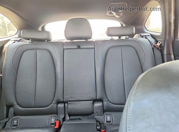 WBXHT3Z35G4A49177 2016 BMW X1 Black Հետևի նստատեղերի տեսք