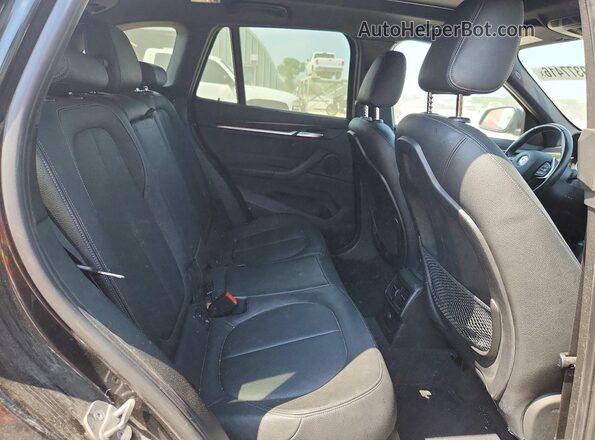 WBXHT3Z35G4A49177 2016 BMW X1 Black Սալոնի հետևի տեսք