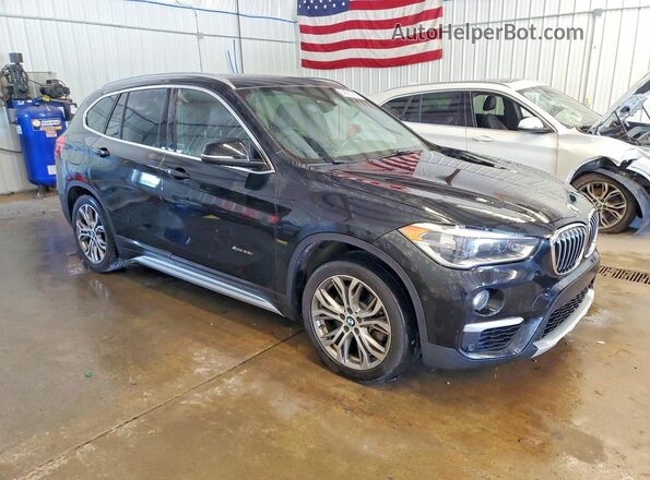 WBXHT3Z35H4A52386 2017 BMW X1 Черный Передняя правая четверть