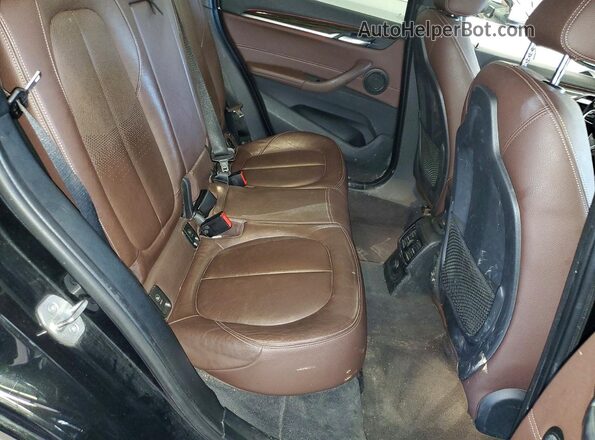 WBXHT3Z35H4A52386 2017 BMW X1 Черный Вид задних сидений