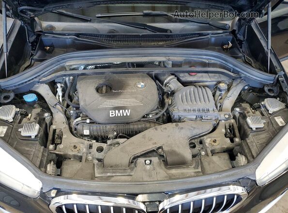 WBXHT3Z35H4A52386 2017 BMW X1 Черный Вид задней части салона