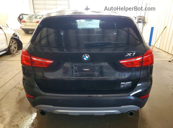 WBXHT3Z35H4A52386 2017 BMW X1 Черный Вид сзади