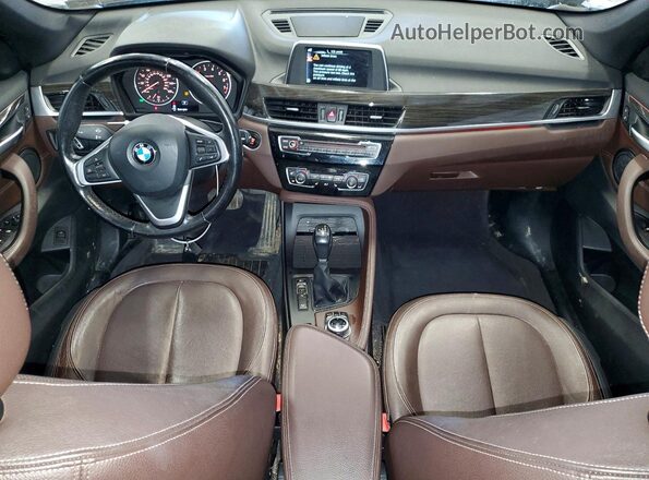 WBXHT3Z35H4A52386 2017 BMW X1 Черный Вид панели приборов