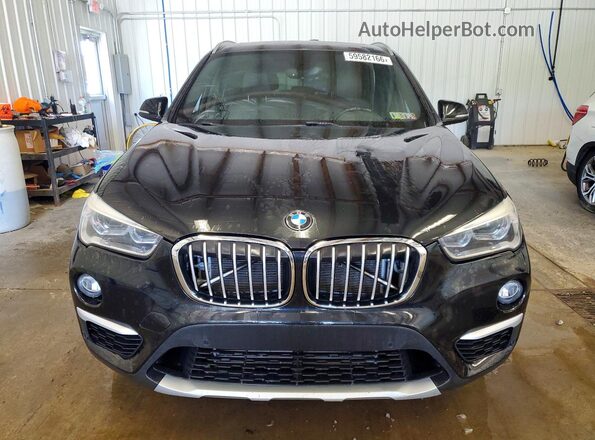 WBXHT3Z35H4A52386 2017 BMW X1 Черный Вид спереди
