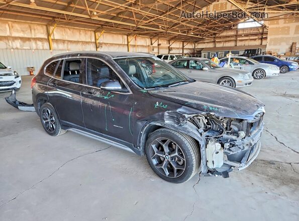 WBXHT3Z36H4A65129 2017 BMW X1 Gray Delantero derecho