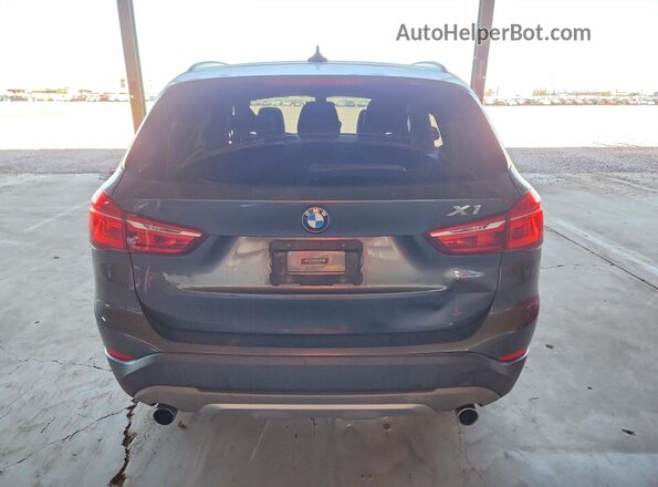 WBXHT3Z36H4A65129 2017 BMW X1 Gray Vista trasera