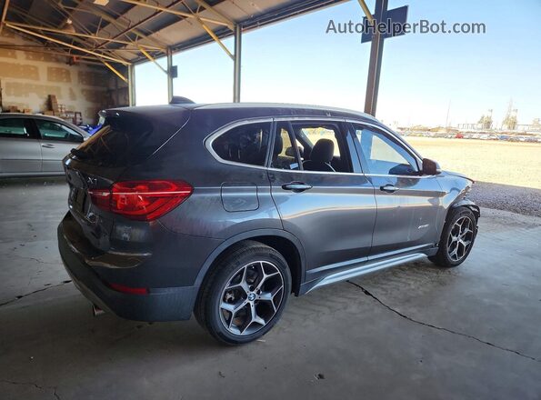 WBXHT3Z36H4A65129 2017 BMW X1 Gray Trasero derecho