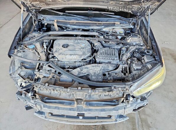 WBXHT3Z36H4A65129 2017 BMW X1 Gray Vista del compartimento del motor