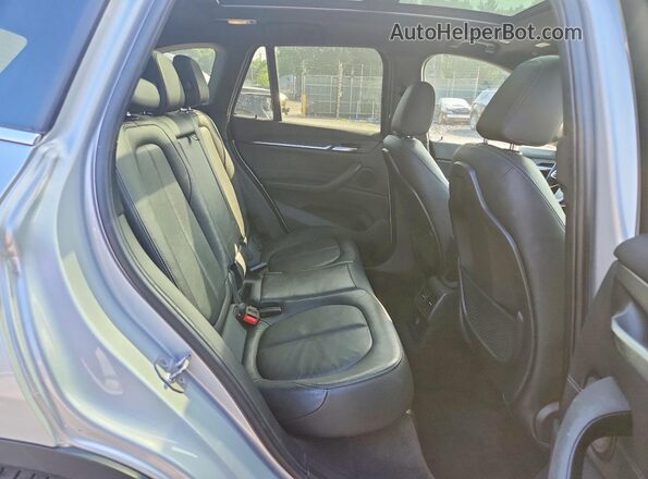 WBXHT3Z39H4A53797 2017 BMW X1 Silver უკანა სალონის ხედი