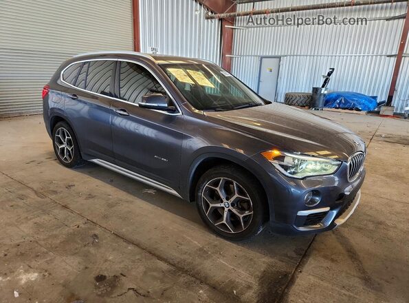 WBXHT3Z39H4A65397 2017 BMW X1 Gray Передня права чверть