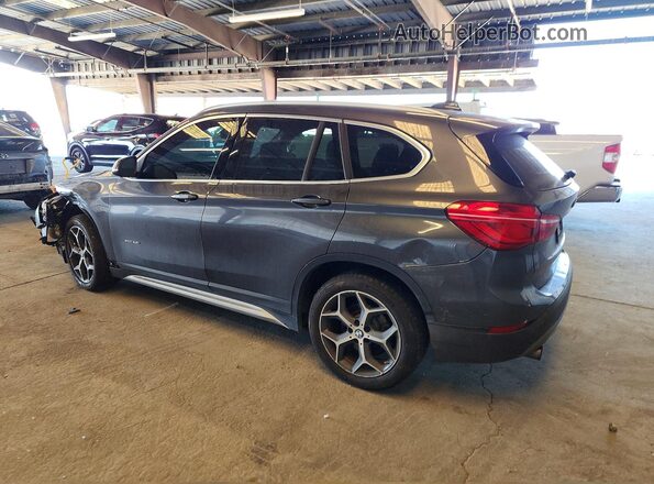 WBXHT3Z39H4A65397 2017 BMW X1 Gray Задня ліва чверть