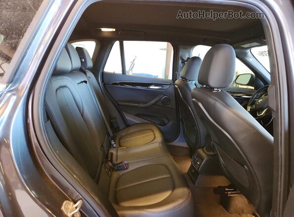 WBXHT3Z39H4A65397 2017 BMW X1 Gray Вид задніх сидінь