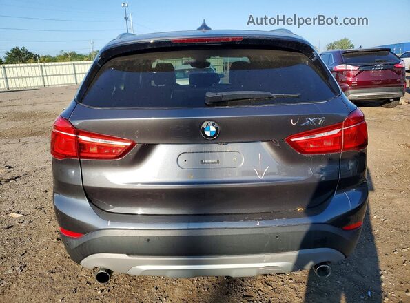 WBXHT3Z3XH4A65618 2017 BMW X1 Gray Rear view