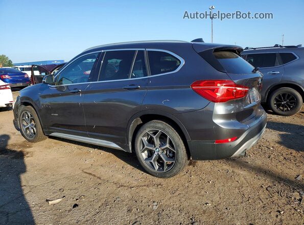 WBXHT3Z3XH4A65618 2017 BMW X1 Gray Rear left