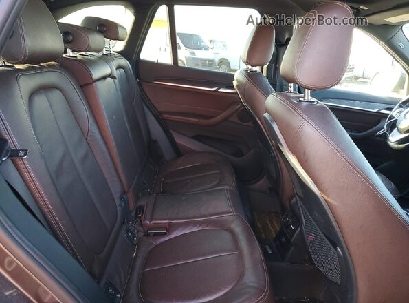 WBXHT3Z3XH4A65618 2017 BMW X1 Gray Rear interior view