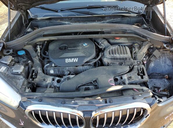WBXHT3Z3XH4A65618 2017 BMW X1 Gray Engine compartment view