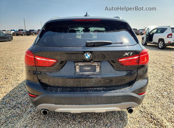 WBXHU7C30H5H34552 2017 BMW X1 Black უკანა ხედი