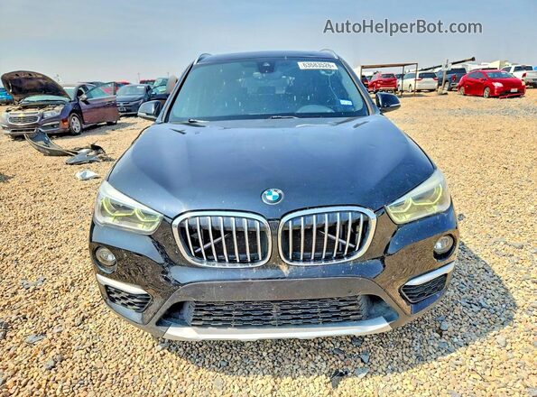 WBXHU7C30H5H34552 2017 BMW X1 Black წინა ხედი