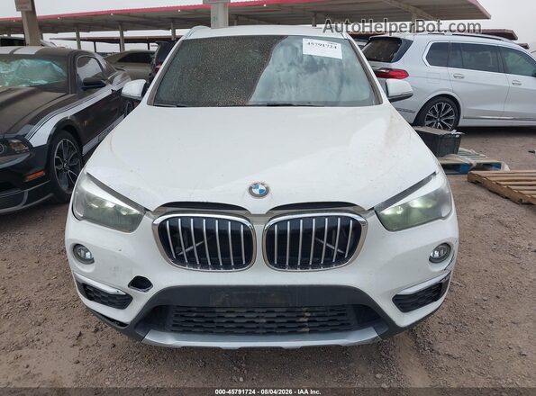 WBXHU7C32J3H43884 2018 BMW X1 White Vista frontal