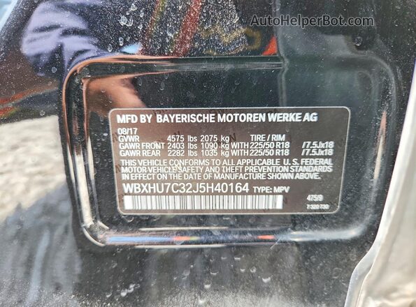 WBXHU7C32J5H40164 2018 BMW X1 Black Vista de la etiqueta del VIN