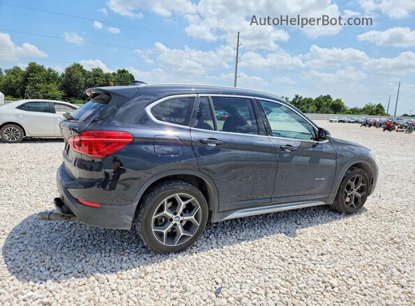 WBXHU7C32J5H40164 2018 BMW X1 Black Trasero derecho