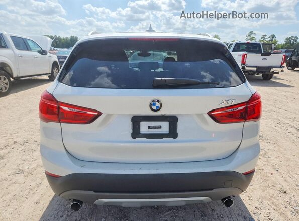 WBXHU7C32J5H45915 2018 BMW X1 White Հետևի տեսք