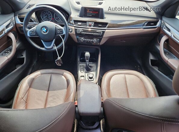 WBXHU7C32J5H45915 2018 BMW X1 White Առջևի վահանակի տեսք
