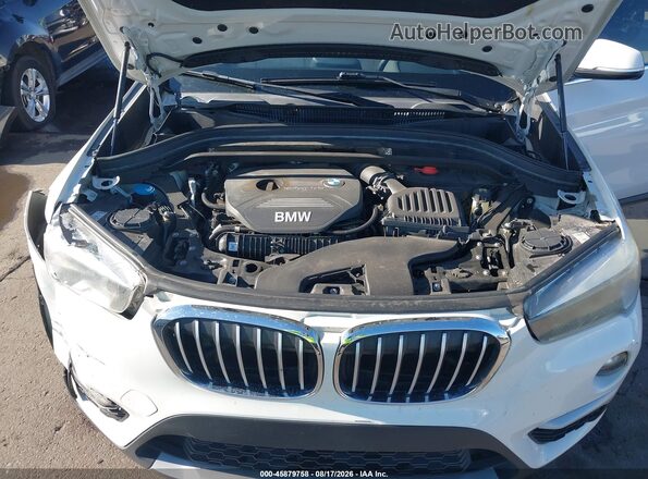 WBXHU7C33HP924590 2017 BMW X1 White Vista trasera