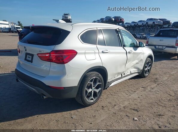 WBXHU7C33J5H39783 2018 BMW X1 White Trasero derecho