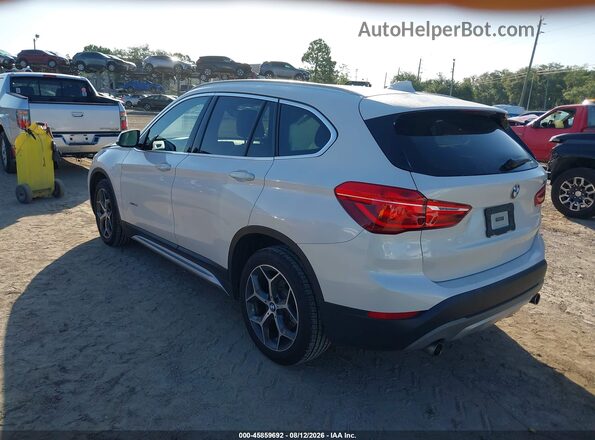 WBXHU7C33J5H39783 2018 BMW X1 White Trasero izquierdo