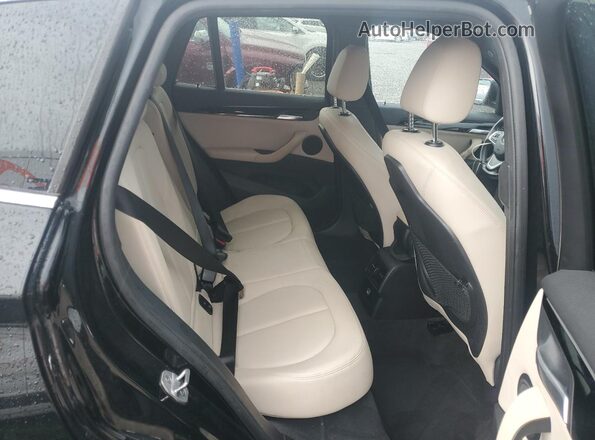 WBXHU7C33J5L05862 2018 BMW X1 Black უკანა სალონის ხედი