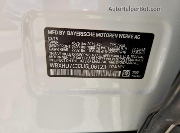 WBXHU7C33J5L06123 2018 BMW X1 White VIN კოდის სტიკერის ხედი