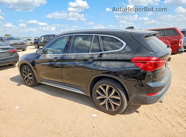 WBXHU7C35H5H34790 2017 BMW X1 Black Rear left