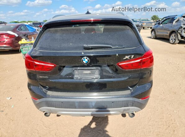 WBXHU7C35H5H34790 2017 BMW X1 Black Rear view