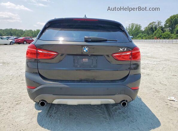 WBXHU7C35H5H37334 2017 BMW X1 Black Вид ззаду