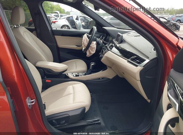 WBXHU7C35J3F04247 2018 BMW X1 Orange Սալոնի դիմացի տեսք