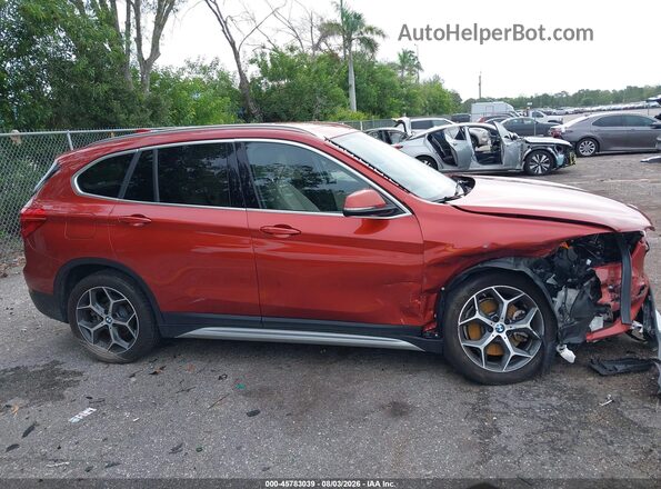 WBXHU7C35J3F04247 2018 BMW X1 Orange Սալոնի հետևի տեսք