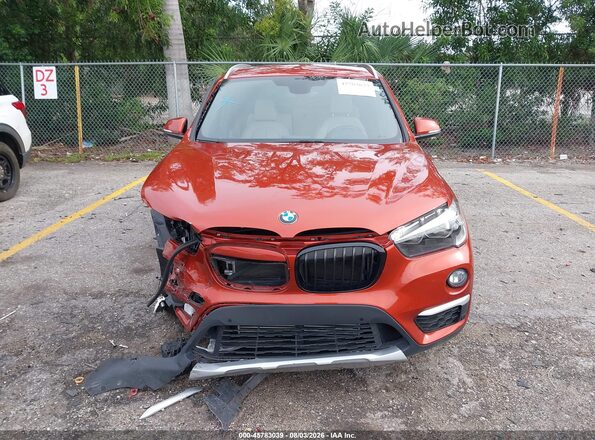 WBXHU7C35J3F04247 2018 BMW X1 Orange Սարքավորումների վահանակի տեսք