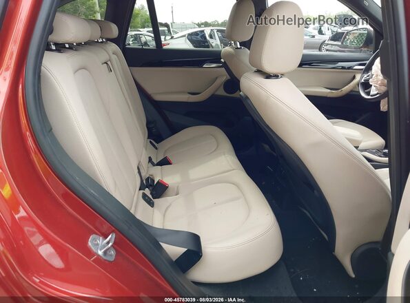 WBXHU7C35J3F04247 2018 BMW X1 Orange VIN կոդի պիտակի տեսք
