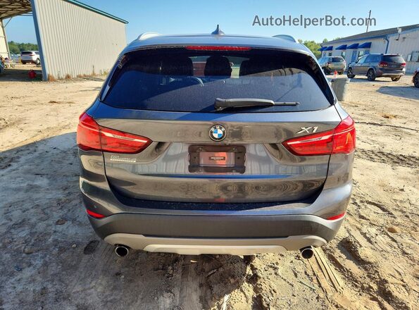 WBXHU7C35J5H41762 2018 BMW X1 Gray Հետևի տեսք