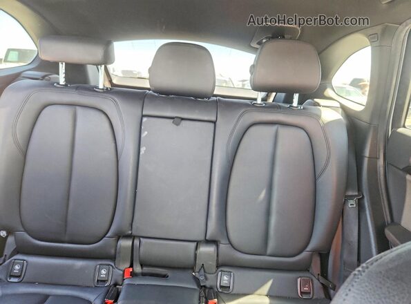 WBXHU7C35J5L08889 2018 BMW X1 White Вид задніх сидінь