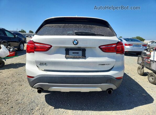 WBXHU7C35J5L08889 2018 BMW X1 White Вид ззаду