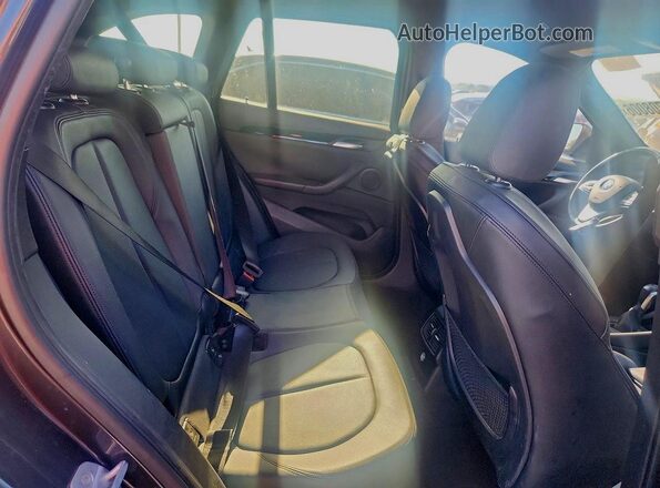 WBXHU7C37H5H36864 2017 BMW X1 Gray Rear interior view