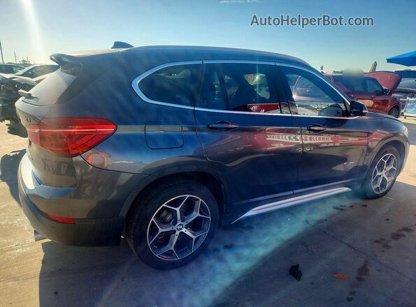 WBXHU7C37H5H36864 2017 BMW X1 Gray Rear right